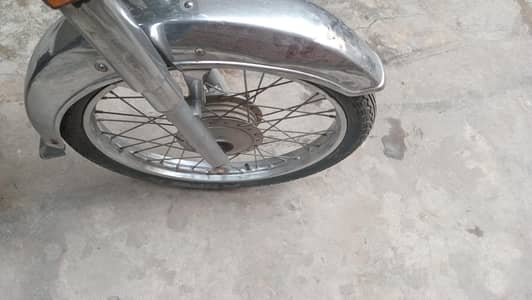bike urgent sale 03246024409whtsup honda70cc7mdel koi kam ni hony wala