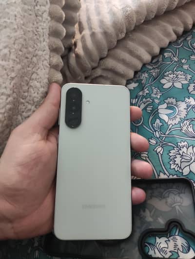 Samsung a56 12 /256 just use 15 days olive colour with box cabel