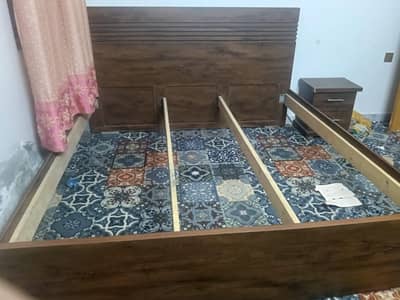 wooden bed dressing table and one side table with foam mattress