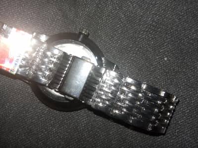 crystal watch in black and white colour