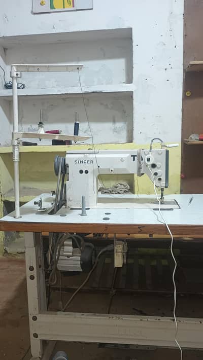 Singer made in Japan all okay machine with servo motor urgent sale