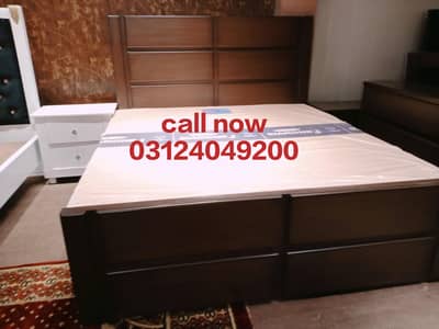 wooden bed with two side tables