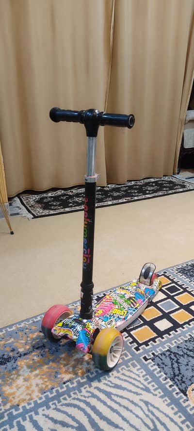 kids scooty, flashing wheels.