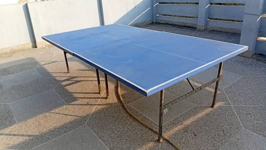 sharp old tv. table tennis table.