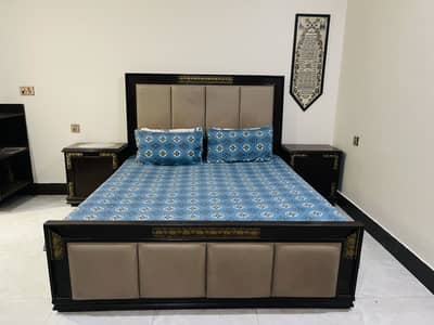 Wooden bed with 2 side tables
