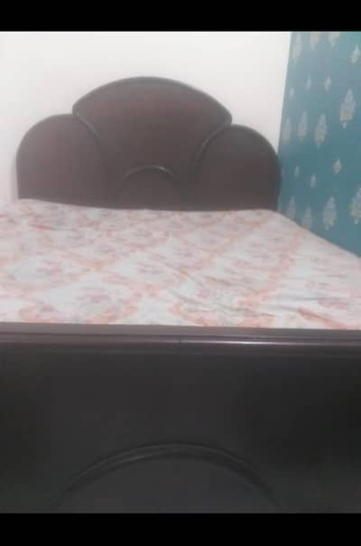 Double Bed (in wood) urgent sale