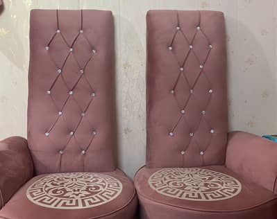 two coffee chairs with a table