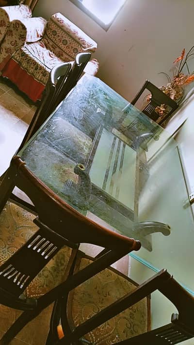 wooden table with glass top