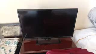 sharp old tv. table tennis table.