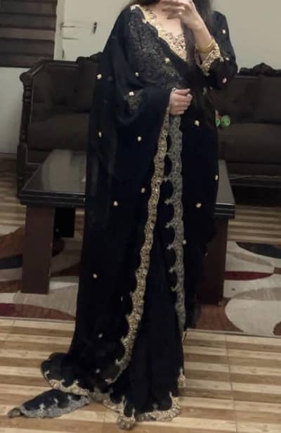Elegant Black Saree with Stitched Blouse – Party & Formal Wear