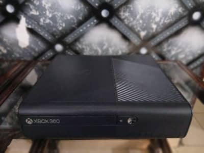 x box 360e slim with 2 controllers