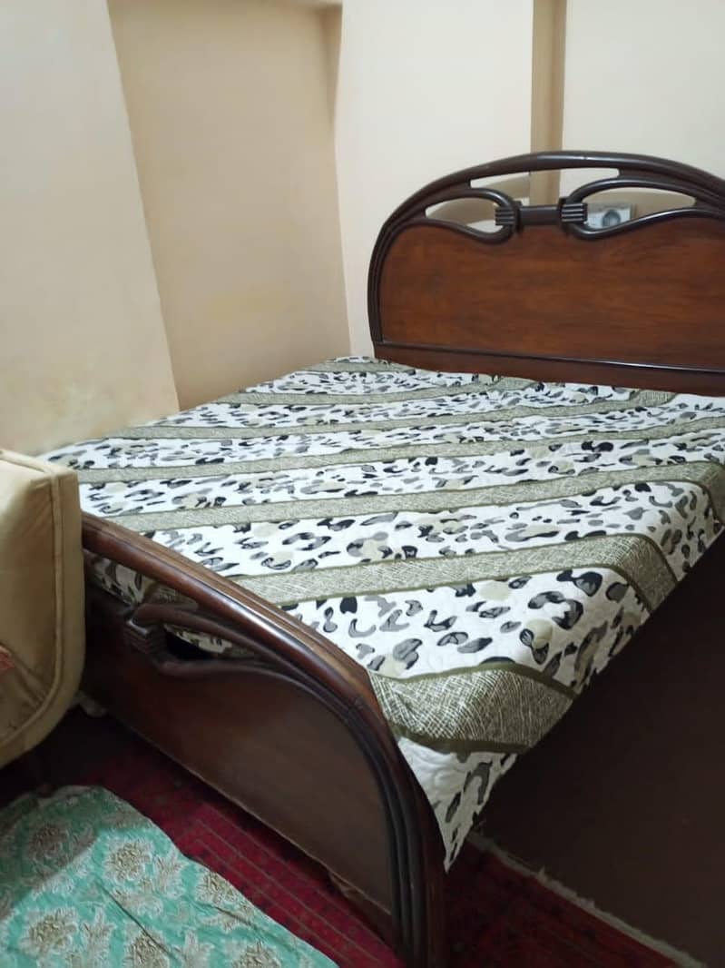 Solid wooden double bed. 0