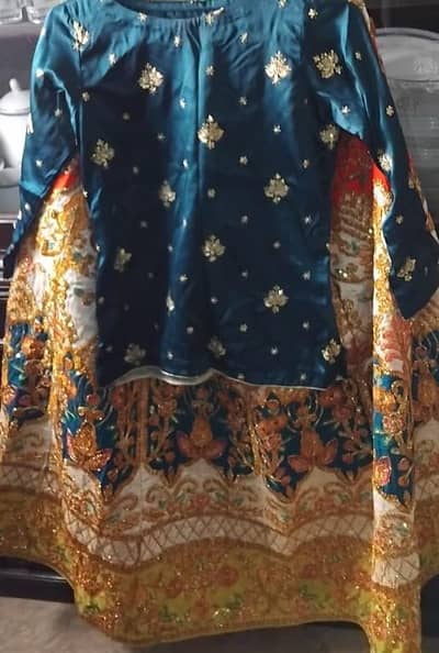 Multi color lehenga with green shirt