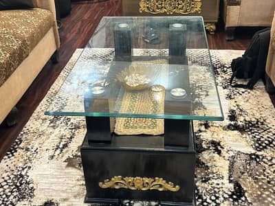 center table for dining and lounge rooms. wood table with glass top