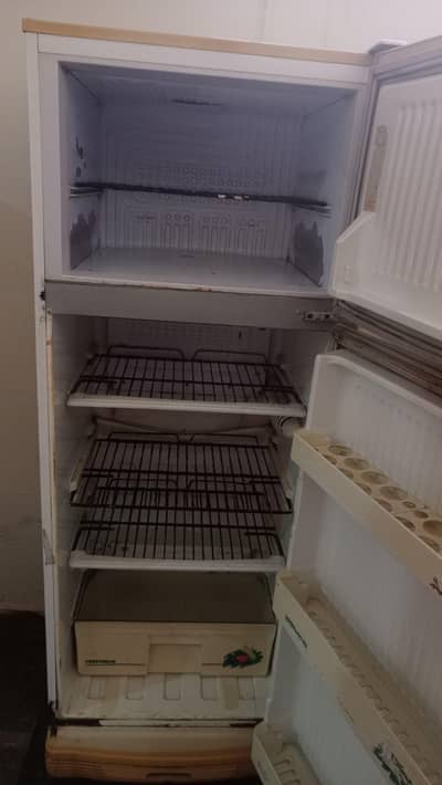 middium size tower fridge for sale . . . demand 25000