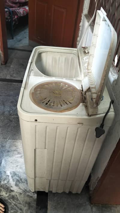 Haier washing machine with contains washer and dryer