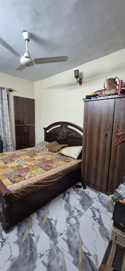 dha phase 2 ext 100 yeards first and 2nd floor for 2 famliy