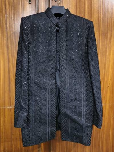 Black Sherwani Coat available. Only one time used.