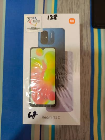 Redmi 12C 128 / 4GB Grey color.