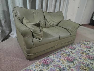 2 Seater Leather Sofa with 2 Pillows – Good Condition