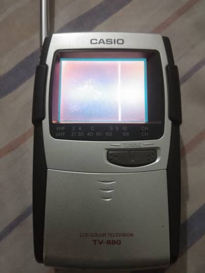 Casio 880 pocket size color t. v on condition channels nh pakar raha