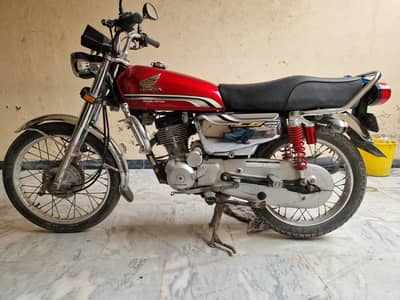 Red Honda 125 Special Edition.