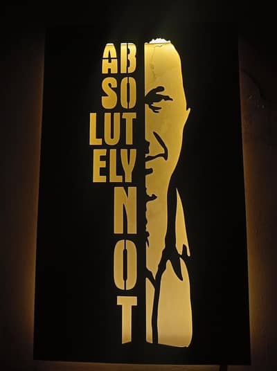 wooden imran khan frame with light