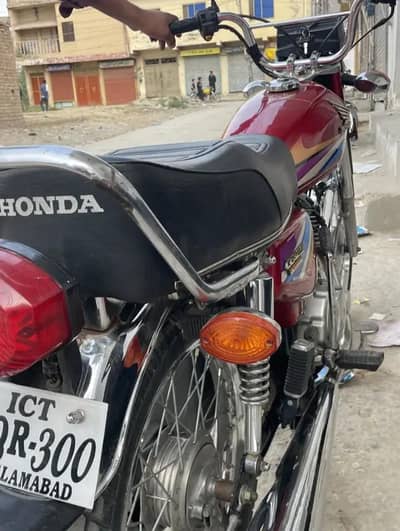 all okay bike red colour bike 2009 model Islamabad number