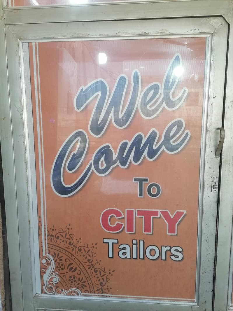 ۔سٹی ٹیلر ٹوپی صوابی 1