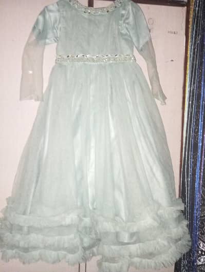 This is see green barbie frock it's very good quality .