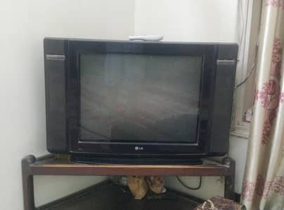 LG T. V with  t. v trolley good condition urgent sale