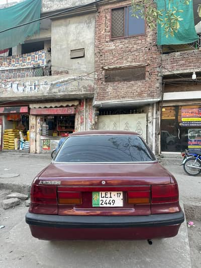 lancer good condition urgent sale petrol + LPG 03710712889