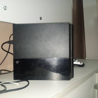 Play Station 4 Slim 500GB with one controller .