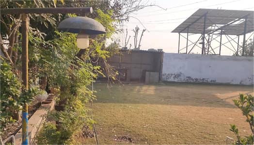 4 kanal Plot with Building on Main Express Way Interchange Big Front On Rent