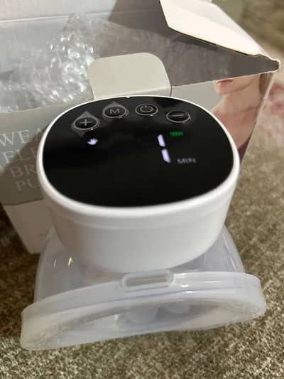 Breastpump -Neat and clean- Lightlyused