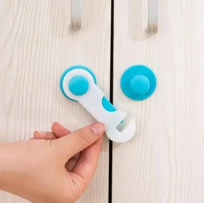 Adhesive drawer lock suitable for cabinets and doors