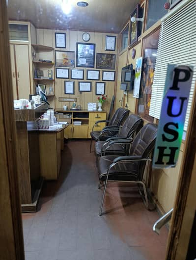 sanitary worker . dusting cleaning  mopping. clinic .