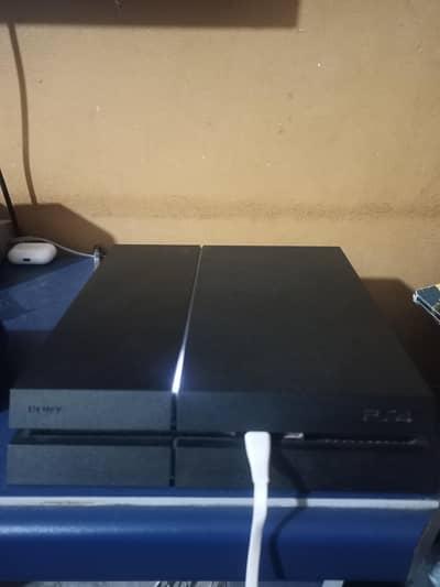 PS4 (Very Good Condition) + 2 Controllers + Games