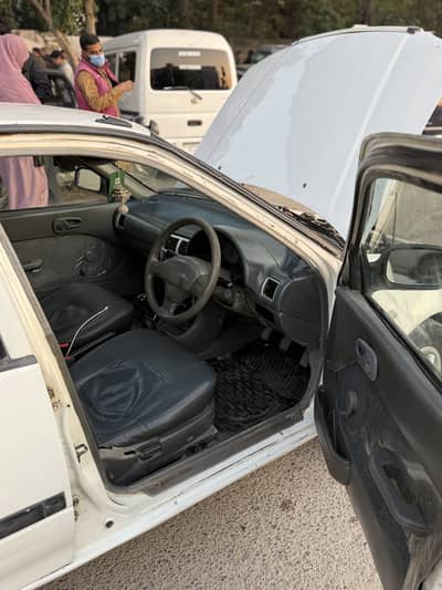 Cultus 2012 model white color Lahore registered