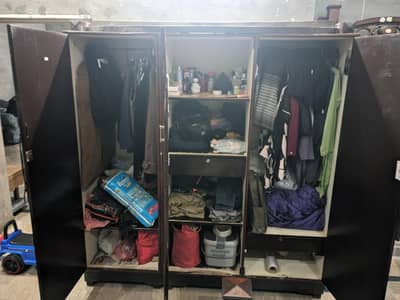 AN CUBORD WITH THREE CABINATES.