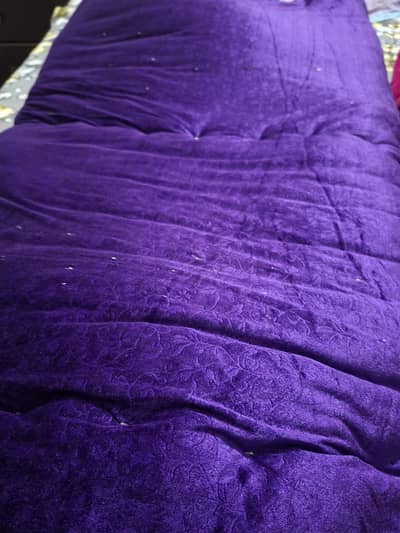 purple velvet quilt+razai with a subtle textured or floral patterns