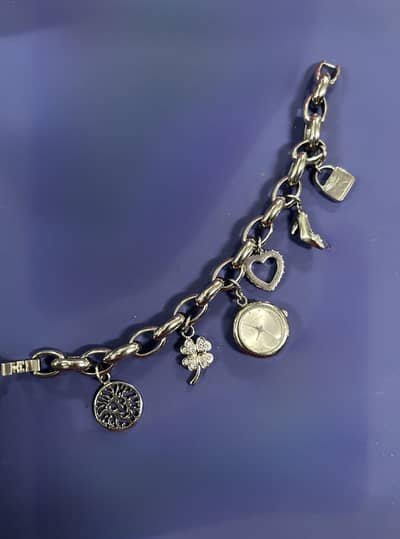Anne Klein Silver-Tone Charm Bracelet Watch.