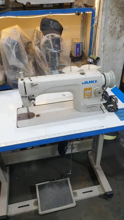 juki 8700 japani machine.  0345-7692978