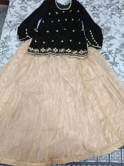 wedding dress in skin and black colour