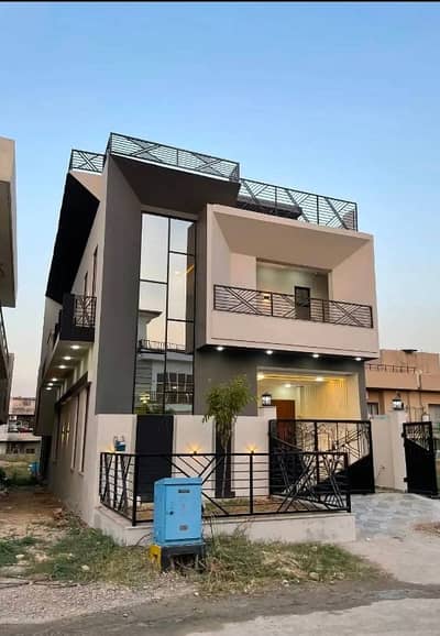 5 Marla Short Corner Brand New House Available For Sale In Block F MPCHS Multi Gardens B-17 Islamabad.