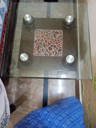 2 wooden glass tables