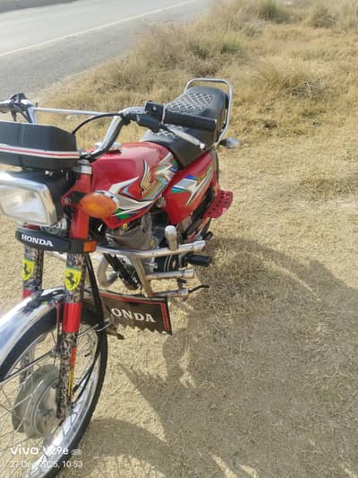 Honda 125 red clr 2023 model  all documents clear biometric avail
