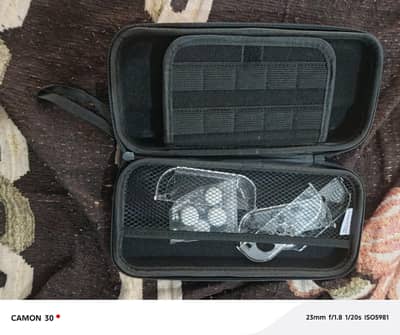 Nintendo switch with 3 games, charger, protection bag and safety case