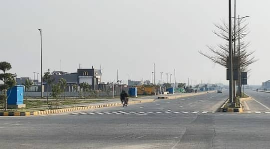 13 marla prime location cornor plot on 100 feet road in Y block phase 7 DHA Lahore