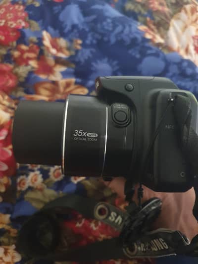 Samsung wb1100F 70x zoom 35x video zoom 2 bettery  strap charging cabl